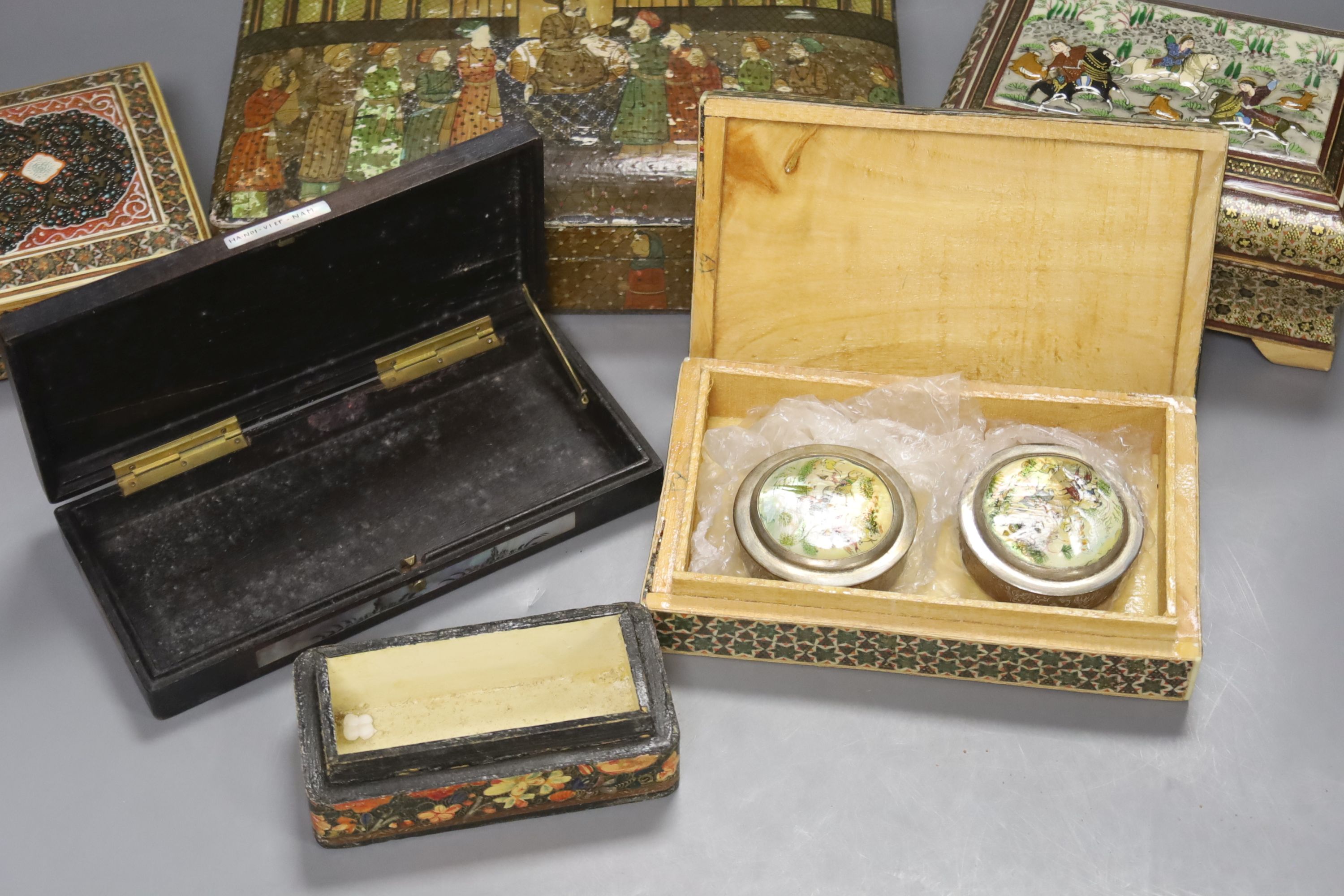 Four Persian painted lacquer boxes and four others